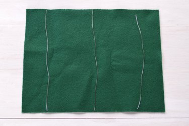 Set a strand of wire in each 1/3 of the felt