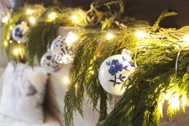 Chinoiserie ornaments hung in garland.